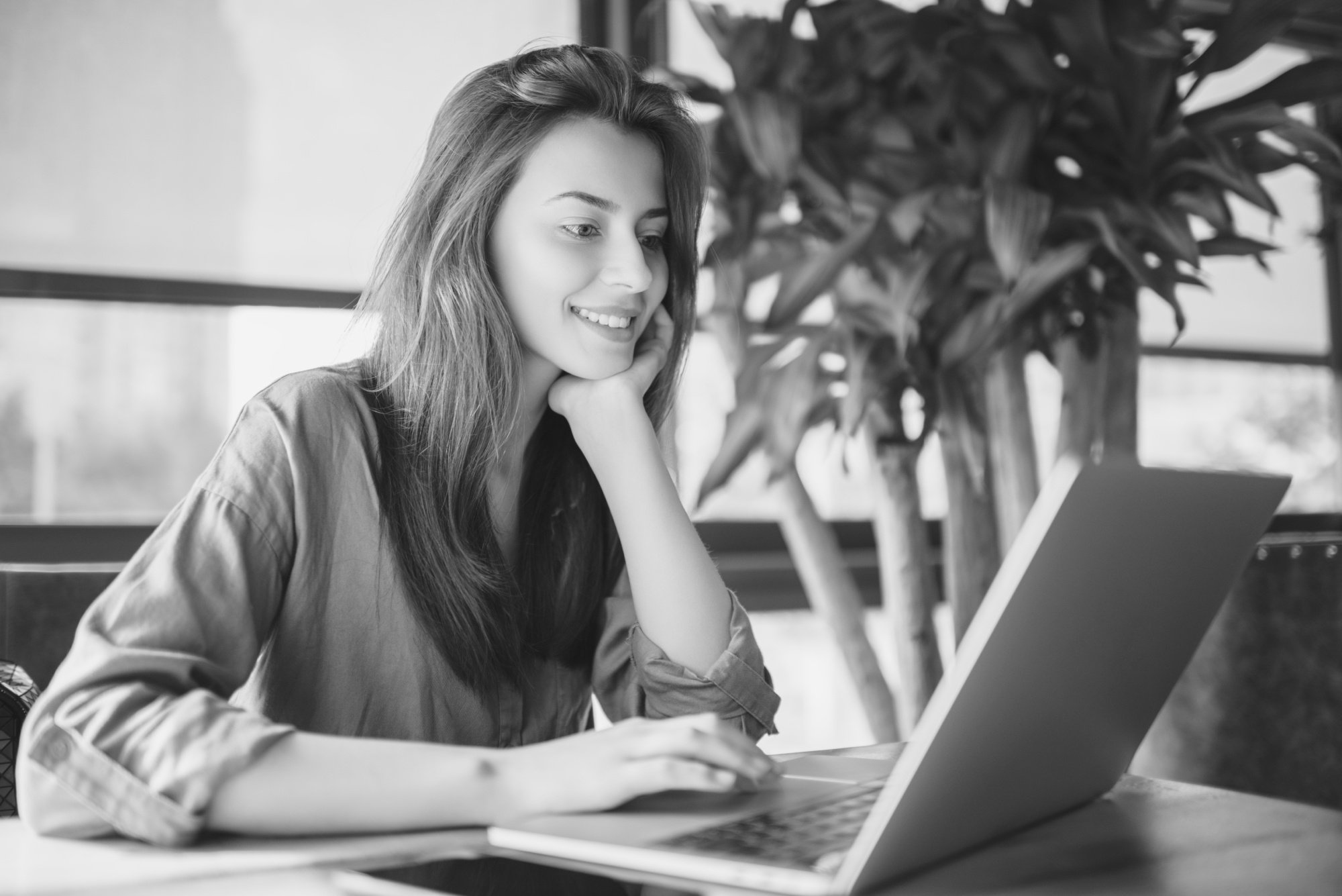 Woman Using A Laptop BW